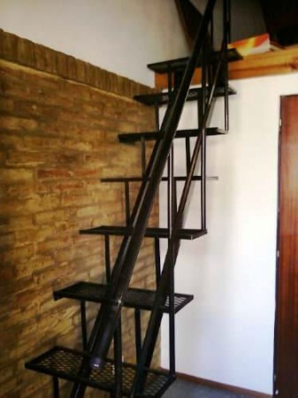 ESCALERA DE PATIO LINPIA ZAPATOS